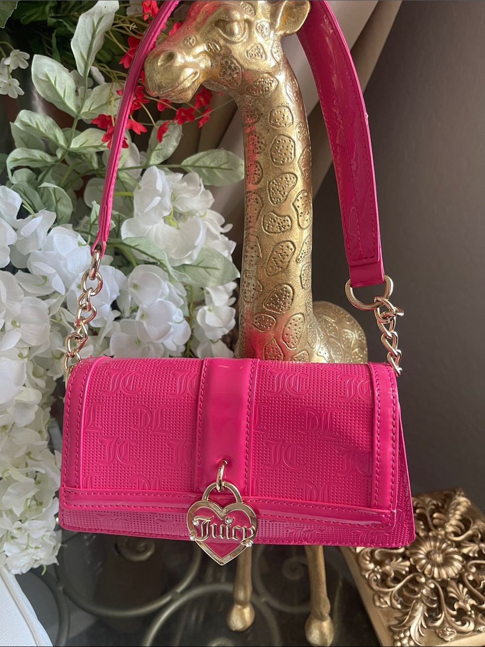 Juicy Couture "Pink Y2K style shoulder bag with embossed branding  & heart charm